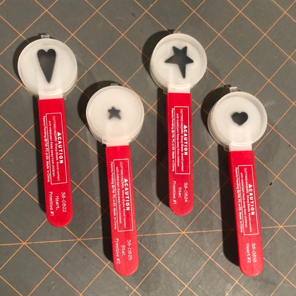 4. Sizzix Paddle Punch Positionable hand Punch dies